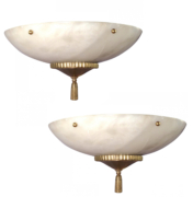 Large bowl Sconces made from alabaster with brass hardware.