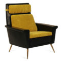 mid-century style lounge chair with headrest and brass legs