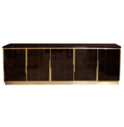 Dark Macassar ebony wood with angular brass details and linear brass base
