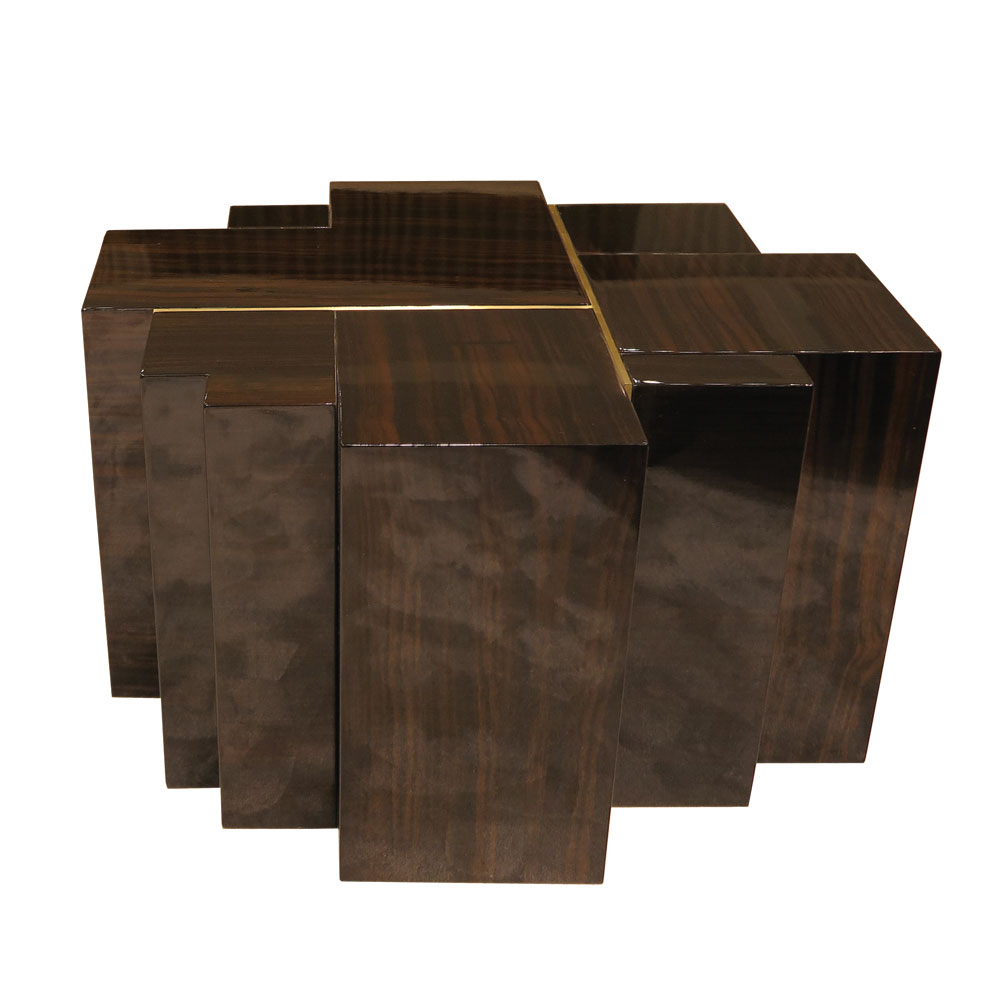Asymmetrical side table of wood blocks with brass inlay