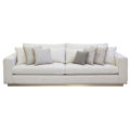 Modern Sofa with channel upholstery and recessed brass metal base