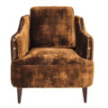 upholstered lounge armchair with wood and metal details on arms and wooden legs