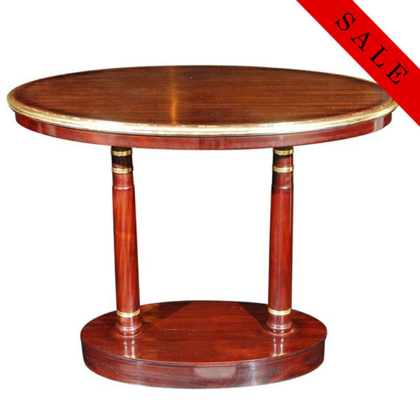 Double pedestal oval Empire side table in Mahogany with gold leaf