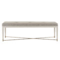 clean lined modern upholstered bench with brass metal crossbar