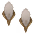 Art Deco Glass sconces with brass bas relief hardware.