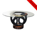 Round dining table with glass top, black lacquer rings, and Macassar Ebony base with high gloss finish.