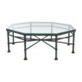 Coffee table Lorenzo features an octagonal glass top with wrought iron frame.