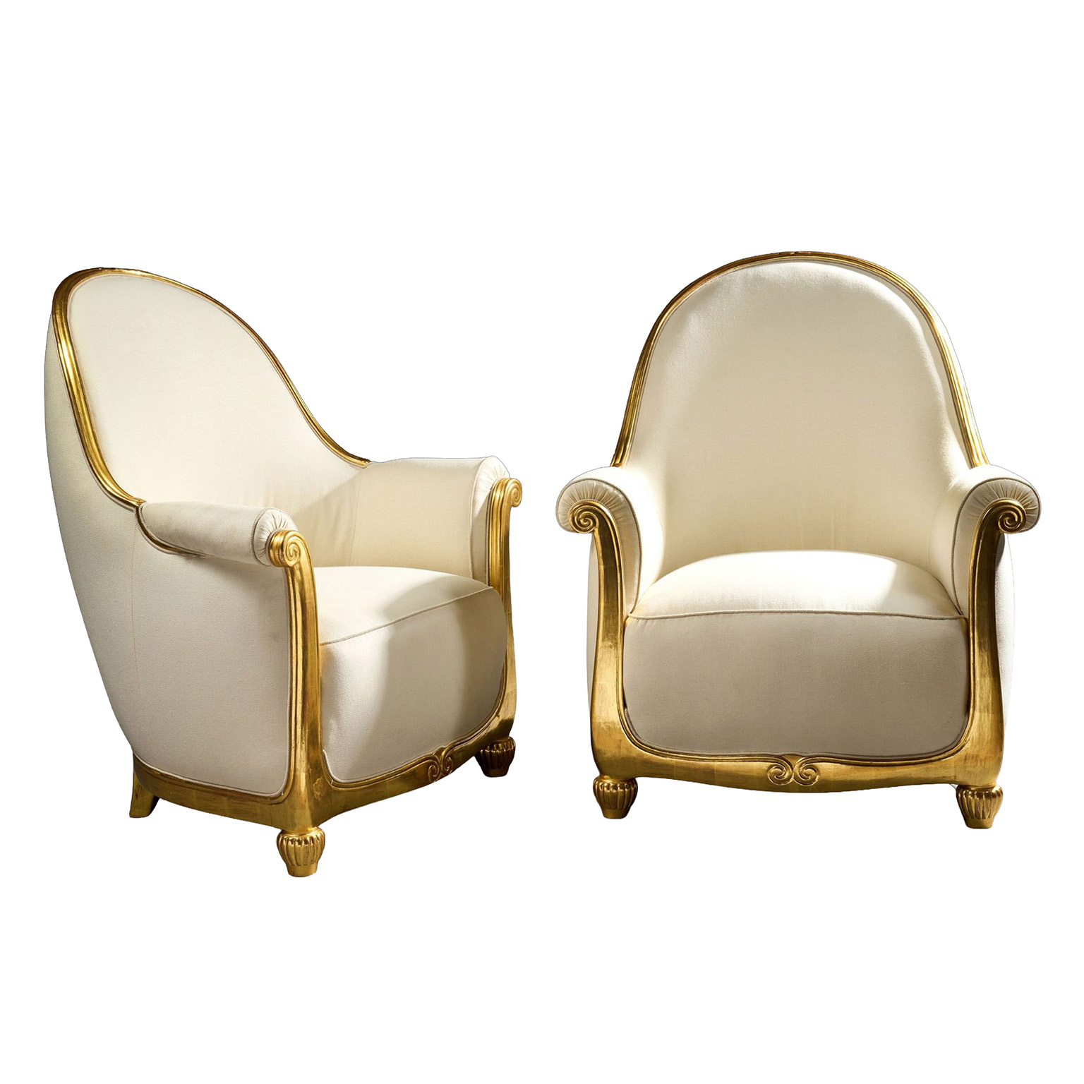 Art Deco lounge chairs with carved gold leaf frames and cream upholstered